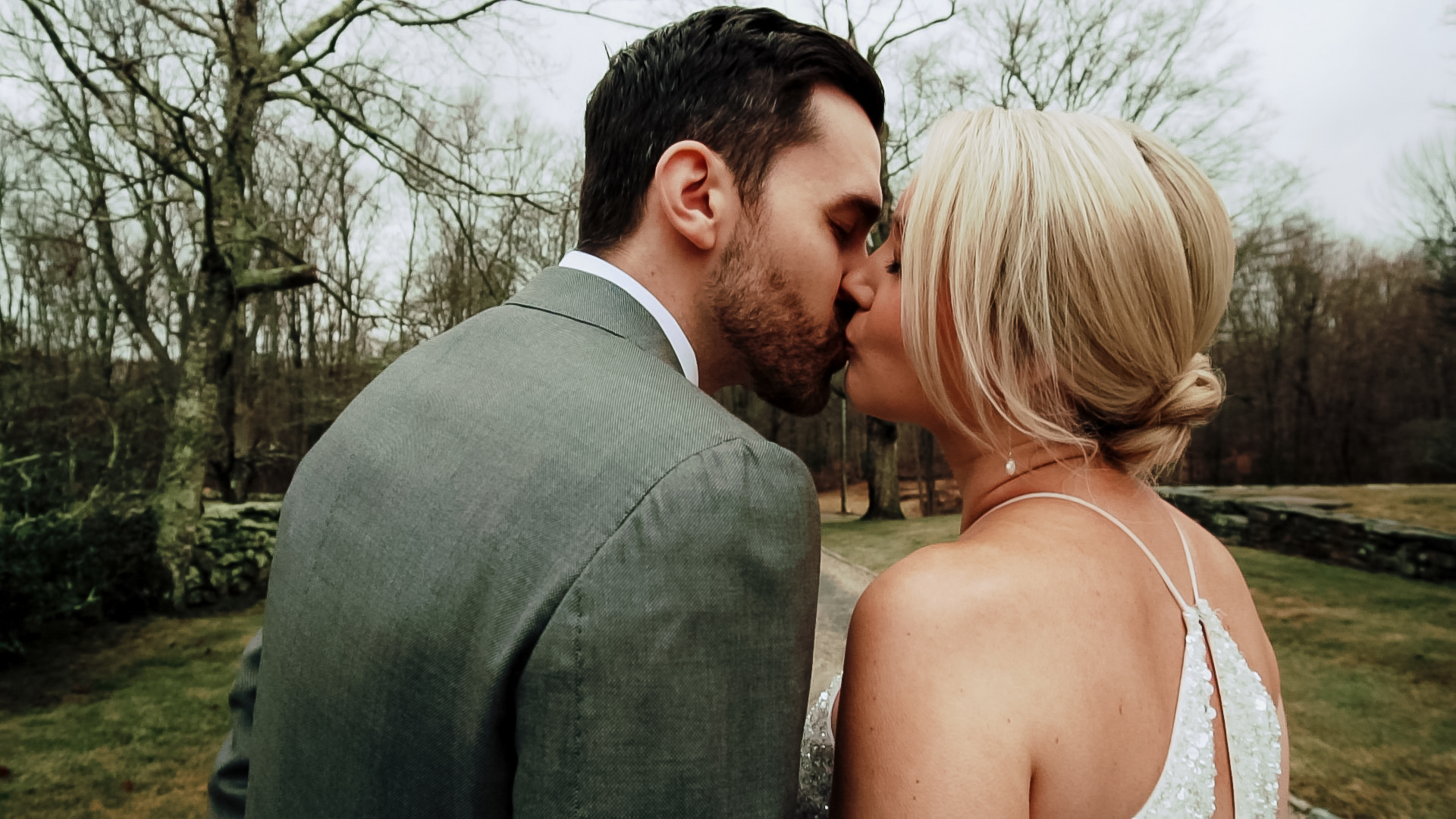 Bride and groom kissing at Smith Farm Gardens in Pomfret, CT